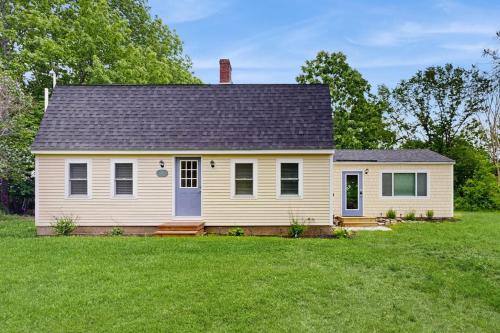 Wiscasset House | Elegant home with a cozy living area, Wifi, backyard, and washer/dryer