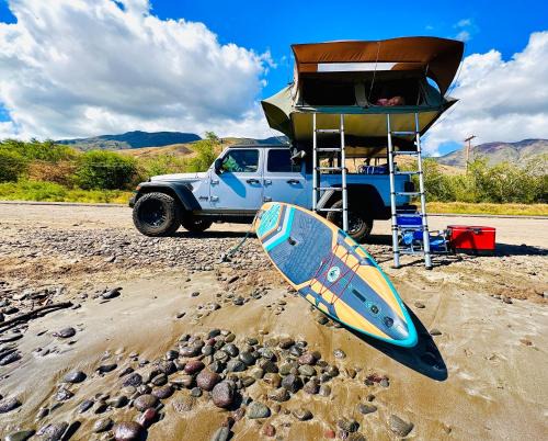 Paia Other | Embark on a journey through Maui with Aloha Glamp's jeep and rooftop tent allows you to discover diverse campgrounds, unveiling the island's beauty from unique perspectives each day