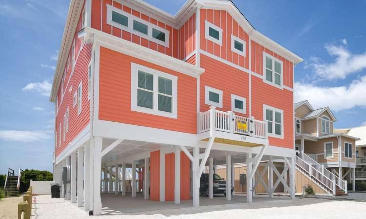 Holden Beach House | Hobbs Realty - Glad you're "Knot At Work" in this oceanfront home with a heatable pool and elevator