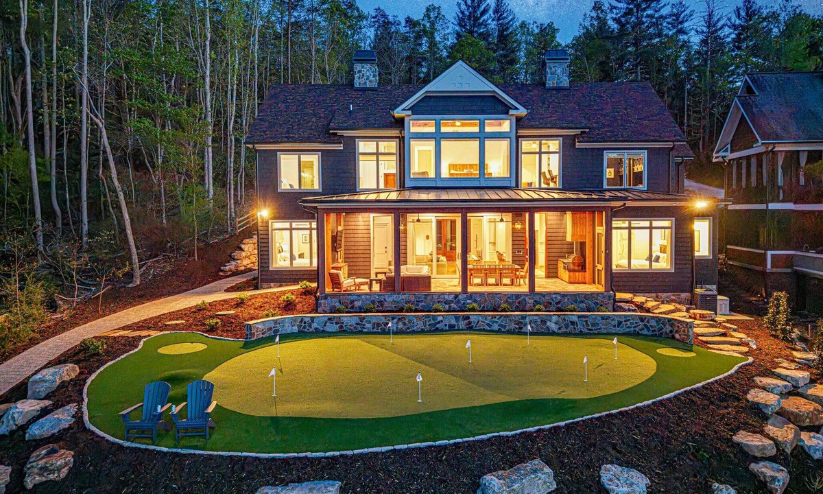 Marion House | New Designer Lakefront Dock Putting Green Golf Sim