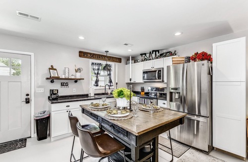 Wichita House | A guest FAVORITE! Front door parking, private covered patio, fenced in backyard