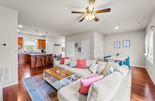 Colington Harbour House | Canal-view, dog-friendly home with private hot tub, deck & grill - near beach