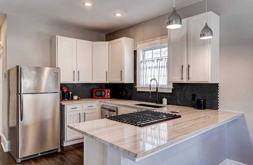 West Riverside House | Charming 3BR Uptown home with fenced yard. Walk to Magazine St, near streetcar & FQ.