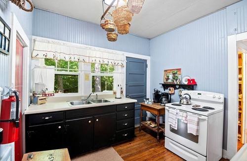 Greeneville Cabin | Charming Glamping Rental with Fireplace near Great Smoky Mountains National Park