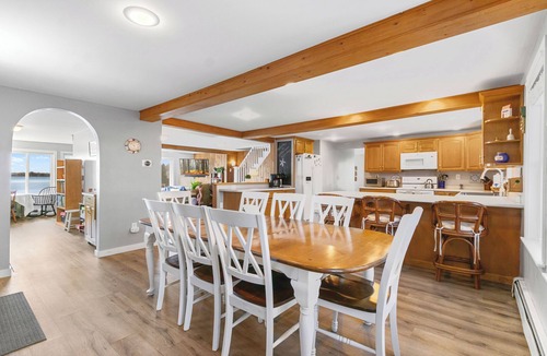 Winthrop House | Cobbossee Hideaway, lakefront property with dock for swimming, fishing, and sunrises
