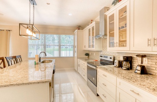 Legacy Park House | Dog-friendly home near Disney World with private pool, pool spa & washer/dryer