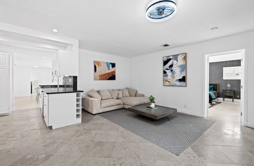 Dolphin Isles House | Entire Lux Home ~ Heated Pool ~ 5 min walk to beach ~ Game Room ~ Bikes