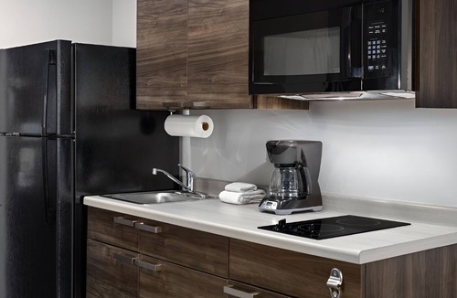 Westgate Hotel | Extended Stay Comfort in Room with Full Kitchen Near Zing Zumm Children's Museum