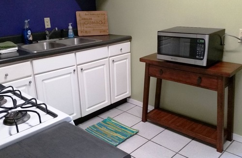 Faubourg Livaudais House | Garden District Streetcar, Gated Driveway & Fenced Yard, Dog Friendly!