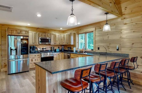 Carrabassett Valley Cabin | Gorgeous dog-friendly cabin with great view, deck, hot tub, & gas fireplace
