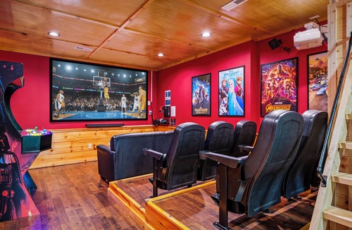 Pigeon Forge Cabin | Indoor Pool-Theater-Bunk Beds with Slide-Game Room-Hot Tub-5 min to Attractions!