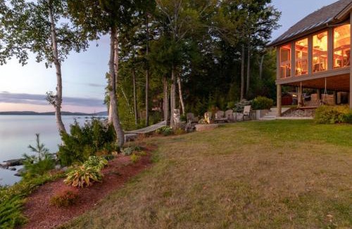 Greenville Junction House | Lakeside Lodge with Amazing Water Views, Screened Porch, Dock, & Firepit