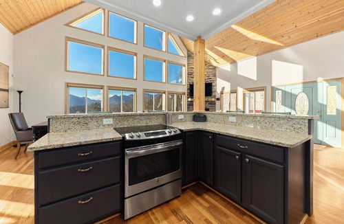 Sunset Cove House | Luxury Home with Amazing Lake & Mountain views, game room, hot tub, lake access!