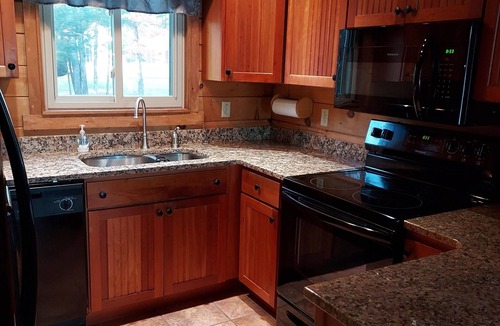 Oakland Cabin | Modern lakeside log cabin on pristine East Pond Oakland Maine's Belgrade Lakes