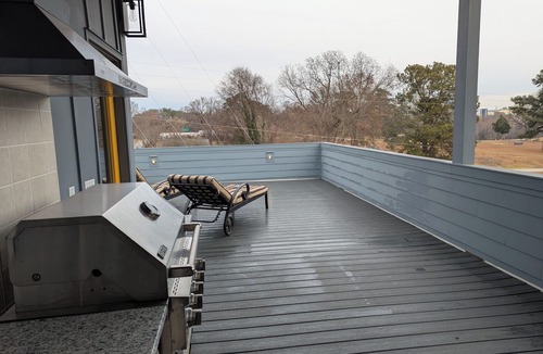 Southwest Raleigh House | Modern Rooftop View Raleigh Downtown SFH-Yellow