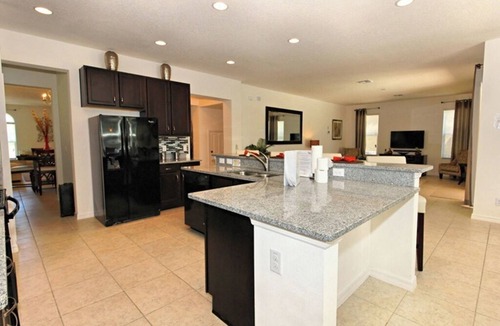 Watersong Villa | Near Disney 6BR Villa | Huge 40ft Screened Pool Deck | No Front & Rear Neighbors