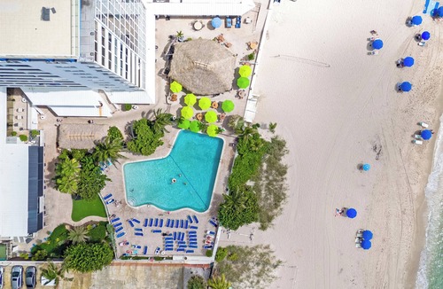Galt Mile Apartment | Oceanfront Relaxing Escape w/Hockey Table and Lux Furniture Gem on the Beach