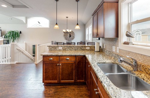 Whalehead Beach House | Oceanside home with private hot tub, central AC, fireplace, and pool access