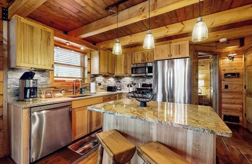 New Lisbon House | Peaceful log cabin with patio, gas grill, fire pit & WIFI