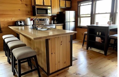 Norwalk Cabin | Private Lakefront Cabin with Hot Tub, Beach and Room for 10