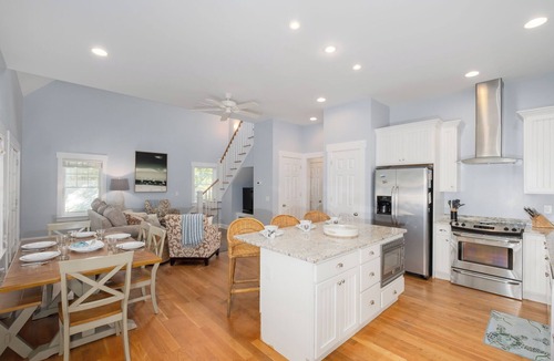 Cape Fear Station House | Reel Life-a PET FRIENDLY cottage tucked into a wooded bend in Cape Fear Station!