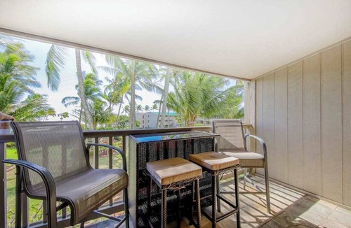 Ualapue Condo | Relax on a Shaded Lanai in an Ocean-View Condo with Pool & Cabana