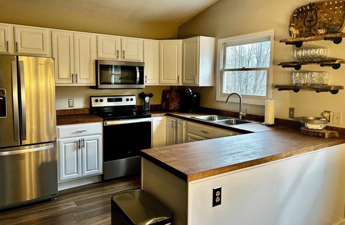 Seven Devils House | Relaxing retreat on Otter Falls with views of Grandfather Mountain.