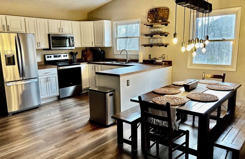 Seven Devils House | Relaxing retreat on Otter Falls with views of Grandfather Mountain.