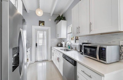 Dolphin Isles Apartment | Seashell~Walk To The Beach~Comfy Beds~Firepit~Pool