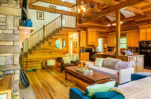Hot Springs Cabin | Secluded Luxury Cabin with Private Waterfall, Mountain Views, Game Room, and Scenic Hiking Trails