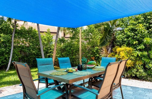 South Corals House | Spacious 3-Bedroom Villa with Heated Saltwater Pool and Fenced Yard in Oakland Park