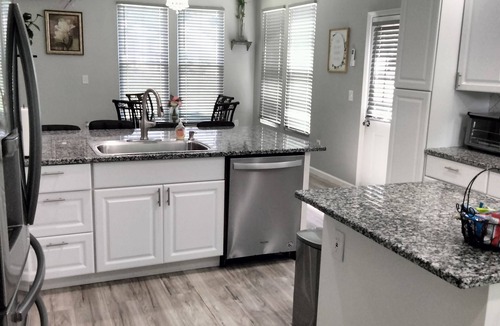 Lilburn House | Spacious 4-bedroom home with WiFi, AC/heat, and BBQ- grill in charming Lilburn.