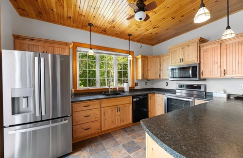 Smithfield House | Stunning Lakefront Retreat set on a Private point on North Pond, 9 acres w/beach