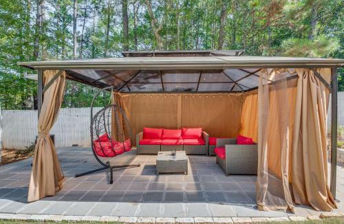 Ellenwood House | Theater Room + Gazebo: Luxury Retreat in Ellenwood