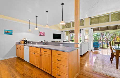 Maunaloa Condo | Tropical condo with wraparound lanai, quiet beaches, pool access, & W/D