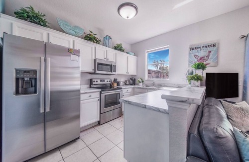 Regal Palms House | TROPICAL RESORT! 3 Pools, Lazy River, Water Slide +more! 4 BED/3 BATH