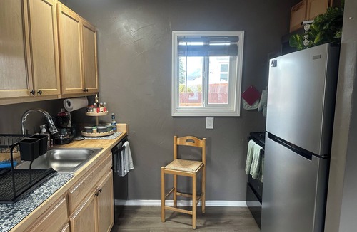 Russian Jack Park House | Unique 1 bedroom custom remodeled low energy foot print unit in private complex.