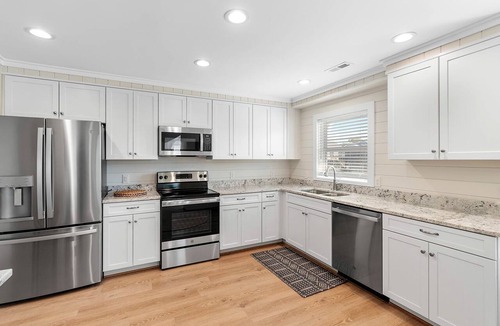 Holden Beach Cabin | Waterfront Canal Home with Boat Dock Near Beach Carolina Beach North Carolina