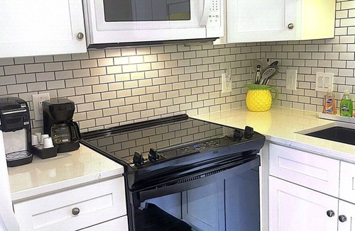 North Carolina Coast Condo | Welcome to Bikini Bottom enjoy the ocean or pool. 1 block to beach.