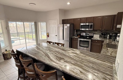 Windsor Hills Villa | YOLO HOUSE - WINDSOR HILLS : LUXURY TIKI BAR & BBQ : ALL DAY SUN :NEAR DISNEY