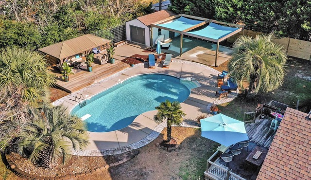 4 bedroom 3 bath with tranquil saltwater pool oasis! Sleeps up to 12