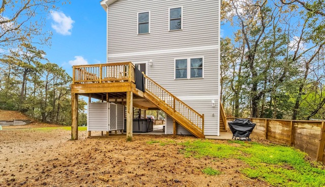 Canal-view, dog-friendly home with private hot tub, deck & grill - near beach
