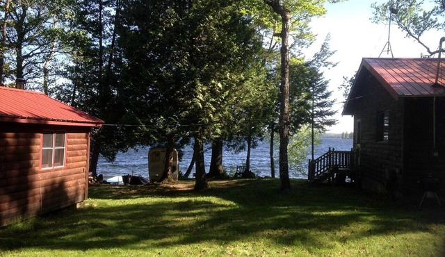 Charming Lakefront Cabin Rental with a Fire Pit near Brownville, Maine