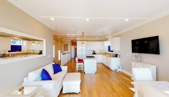 Coastal-themed beachfront home with water views, grill, & beach access in Seal Beach