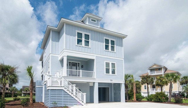 Home with pool access located within The Rookery community at Litchfield By the Sea.