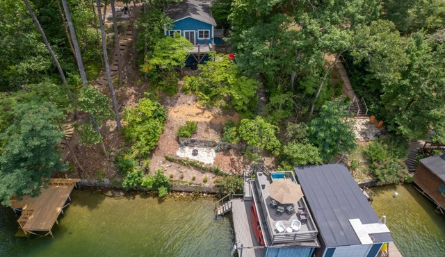 Max's Blue Lakeside Cottage | Pet Friendly Lake Lure Cabin with Private Dock & Boathouse Deck