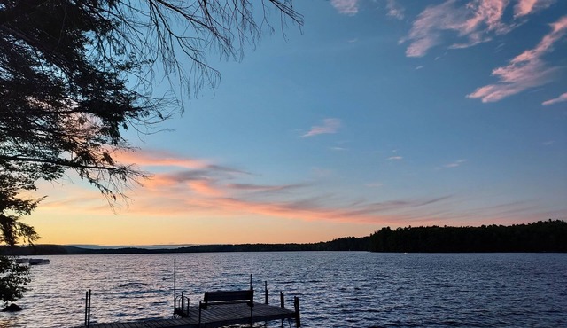 Modern lakeside log cabin on pristine East Pond Oakland Maine's Belgrade Lakes