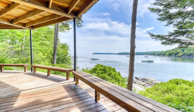 Unique oceanfront home with a deck, tons of natural light, & amazing views