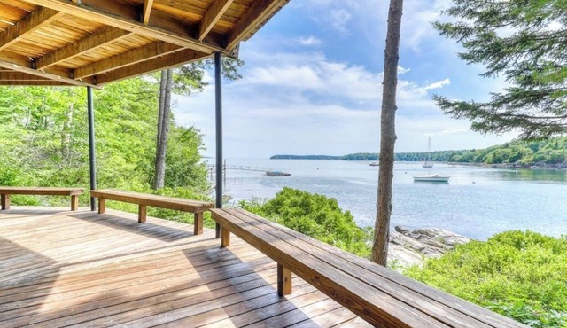 Unique oceanfront home with a deck, tons of natural light, & amazing views