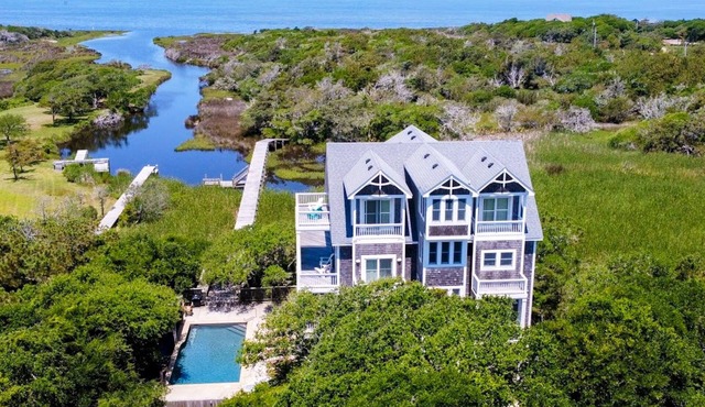 Waterfront home with ocean views, private pool & hot tub